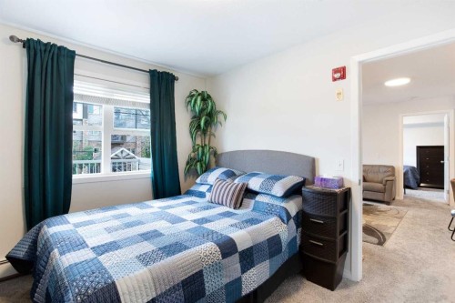 210-2000 Applevillage Court Se, Calgary, AB - Indoor Photo Showing Bedroom