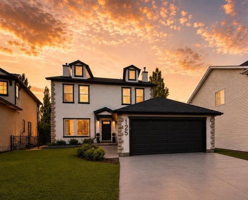 125 Discovery Place Sw, Calgary, AB - Outdoor With Facade