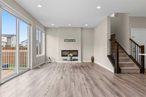 109 Mallard Grove Se, Calgary, AB - Indoor With Fireplace