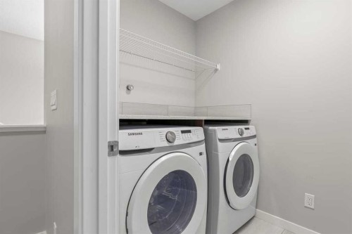 109 Mallard Grove Se, Calgary, AB - Indoor Photo Showing Laundry Room