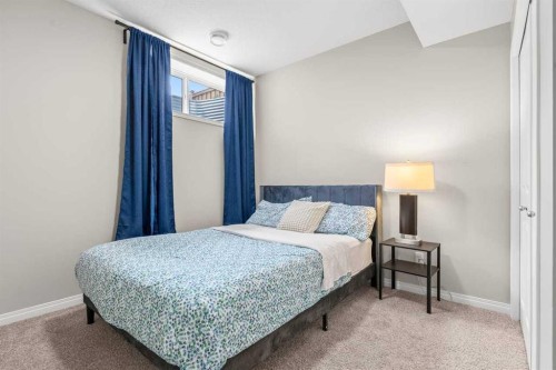 109 Mallard Grove Se, Calgary, AB - Indoor Photo Showing Bedroom
