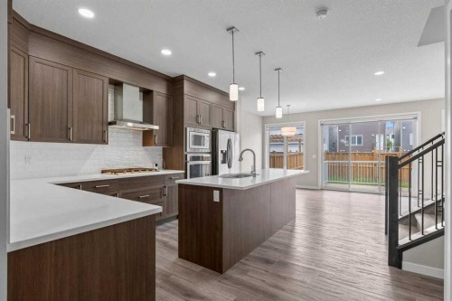 109 Mallard Grove Se, Calgary, AB - Indoor Photo Showing Kitchen With Upgraded Kitchen