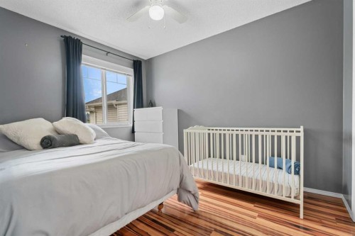 266 Cranwell Bay Se, Calgary, AB - Indoor Photo Showing Bedroom