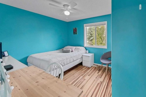 266 Cranwell Bay Se, Calgary, AB - Indoor Photo Showing Bedroom