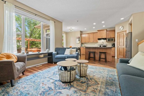 266 Cranwell Bay Se, Calgary, AB - Indoor Photo Showing Living Room