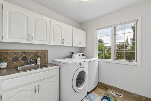 65 Woodpath Terrace Sw, Calgary, AB 