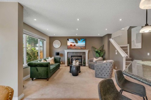 292 Coville Close Ne, Calgary, AB - Indoor With Fireplace