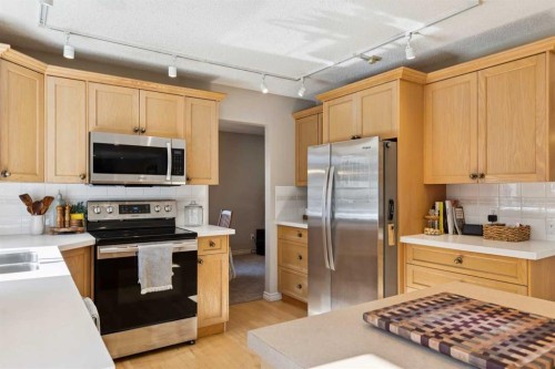 16 Brenner Place Nw, Calgary, AB - Indoor Photo Showing Kitchen With Stainless Steel Kitchen With Double Sink