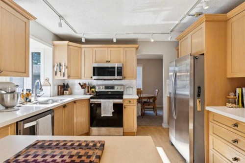 16 Brenner Place Nw, Calgary, AB - Indoor Photo Showing Kitchen With Stainless Steel Kitchen With Double Sink