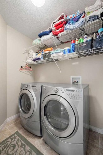 50 Springborough Crescent Sw, Calgary, AB - Indoor Photo Showing Laundry Room