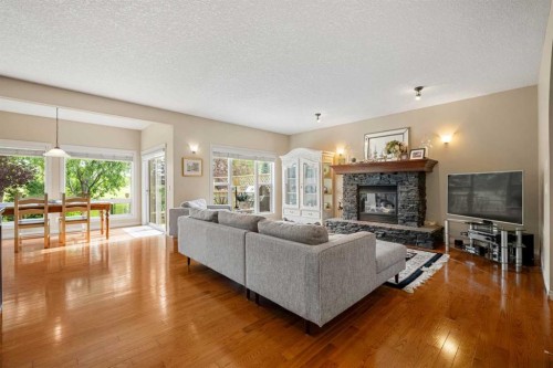 50 Springborough Crescent Sw, Calgary, AB - Indoor Photo Showing Living Room With Fireplace