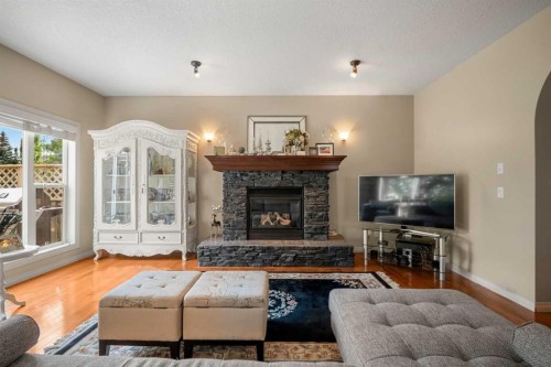 50 Springborough Crescent Sw, Calgary, AB - Indoor Photo Showing Living Room With Fireplace