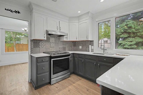 1320 116 Avenue Sw, Calgary, AB - Indoor Photo Showing Kitchen With Upgraded Kitchen