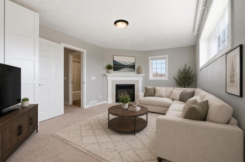 1702 Riverside Drive Nw, High River, AB - Indoor Photo Showing Living Room With Fireplace