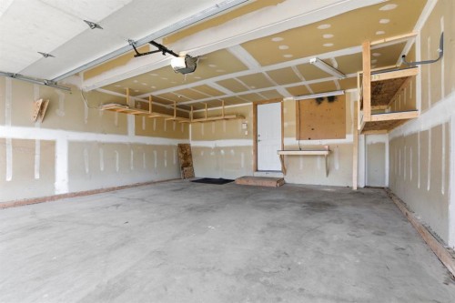 1702 Riverside Drive Nw, High River, AB - Indoor Photo Showing Garage