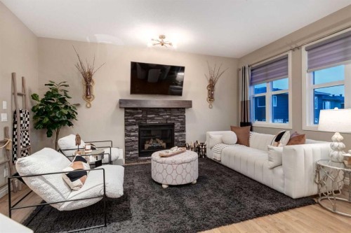 444 Evansglen Drive Nw, Calgary, AB - Indoor Photo Showing Living Room With Fireplace