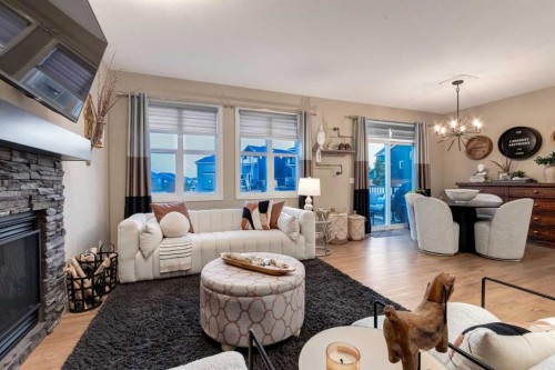444 Evansglen Drive Nw, Calgary, AB - Indoor Photo Showing Living Room With Fireplace