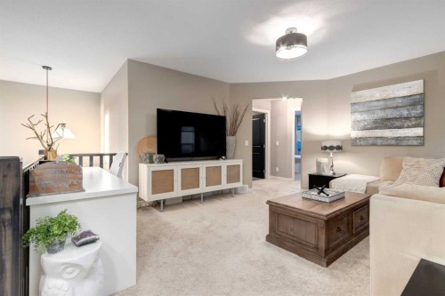 444 Evansglen Drive Nw, Calgary, AB - Indoor Photo Showing Living Room