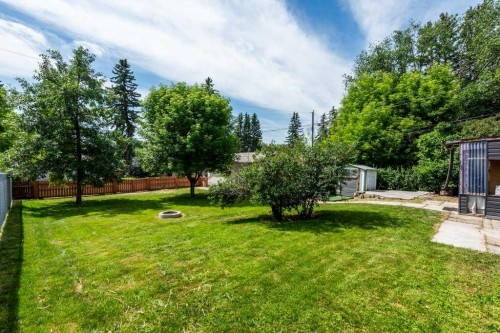 2056 Cottonwood Crescent Se, Calgary, AB - Outdoor With Backyard