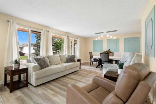 48 Deermont Way Se, Calgary, AB - Indoor Photo Showing Living Room