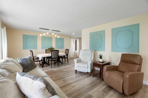 48 Deermont Way Se, Calgary, AB - Indoor Photo Showing Living Room