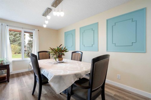 48 Deermont Way Se, Calgary, AB - Indoor Photo Showing Dining Room