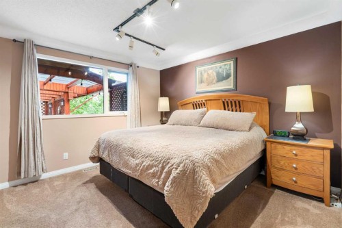 48 Deermont Way Se, Calgary, AB - Indoor Photo Showing Bedroom