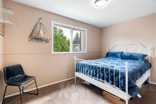 48 Deermont Way Se, Calgary, AB - Indoor Photo Showing Bedroom