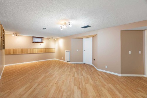 48 Deermont Way Se, Calgary, AB - Indoor Photo Showing Other Room