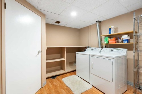 48 Deermont Way Se, Calgary, AB - Indoor Photo Showing Laundry Room