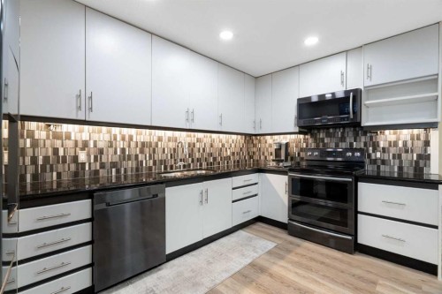 48 Deermont Way Se, Calgary, AB - Indoor Photo Showing Kitchen With Upgraded Kitchen