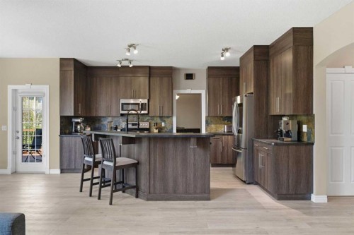 331 Parkmere Green, Chestermere, AB - Indoor Photo Showing Kitchen With Stainless Steel Kitchen With Upgraded Kitchen