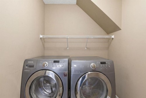 331 Parkmere Green, Chestermere, AB - Indoor Photo Showing Laundry Room