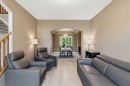 331 Parkmere Green, Chestermere, AB  - Indoor Photo Showing Living Room 