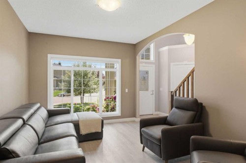 331 Parkmere Green, Chestermere, AB - Indoor Photo Showing Living Room