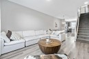 68 Wolf Gate, Okotoks, AB  - Indoor Photo Showing Living Room 