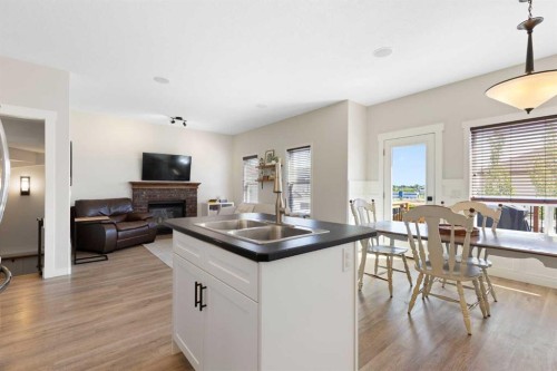590 Coopers Drive Sw, Airdrie, AB - Indoor With Fireplace