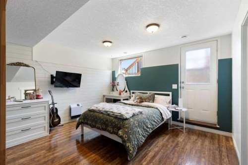 590 Coopers Drive Sw, Airdrie, AB - Indoor Photo Showing Bedroom