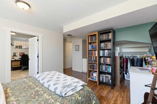 590 Coopers Drive Sw, Airdrie, AB - Indoor Photo Showing Bedroom