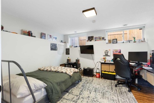 590 Coopers Drive Sw, Airdrie, AB - Indoor Photo Showing Bedroom