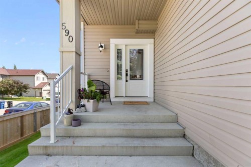 590 Coopers Drive Sw, Airdrie, AB - Outdoor With Deck Patio Veranda With Exterior