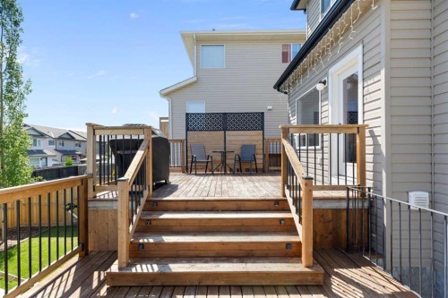 590 Coopers Drive Sw, Airdrie, AB - Outdoor With Deck Patio Veranda With Exterior
