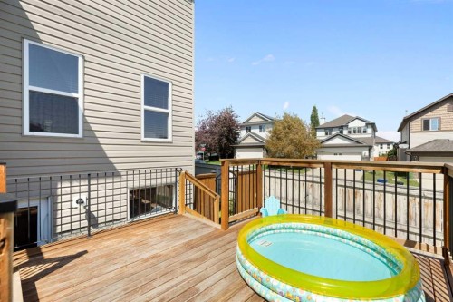 590 Coopers Drive Sw, Airdrie, AB - Outdoor With Deck Patio Veranda With Exterior