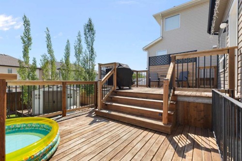 590 Coopers Drive Sw, Airdrie, AB - Outdoor With Deck Patio Veranda With Exterior