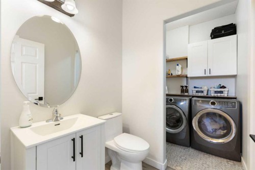 590 Coopers Drive Sw, Airdrie, AB - Indoor Photo Showing Laundry Room