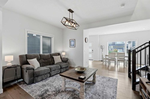 52 Emberside Grove, Cochrane, AB - Indoor Photo Showing Living Room