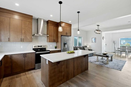 52 Emberside Grove, Cochrane, AB - Indoor Photo Showing Kitchen With Stainless Steel Kitchen With Upgraded Kitchen