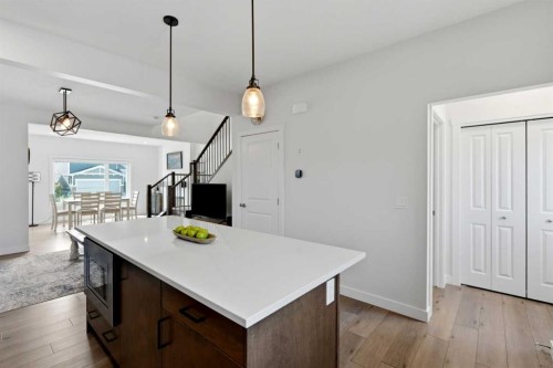 52 Emberside Grove, Cochrane, AB - Indoor Photo Showing Other Room