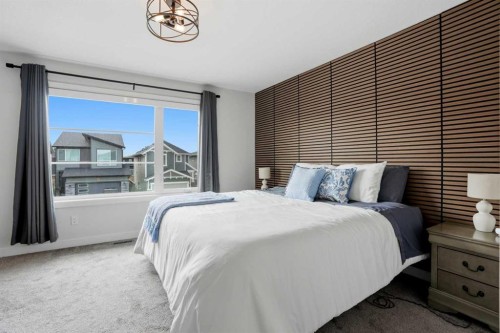 52 Emberside Grove, Cochrane, AB - Indoor Photo Showing Bedroom
