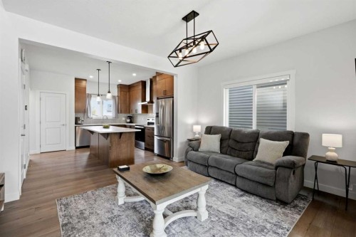 52 Emberside Grove, Cochrane, AB - Indoor Photo Showing Living Room